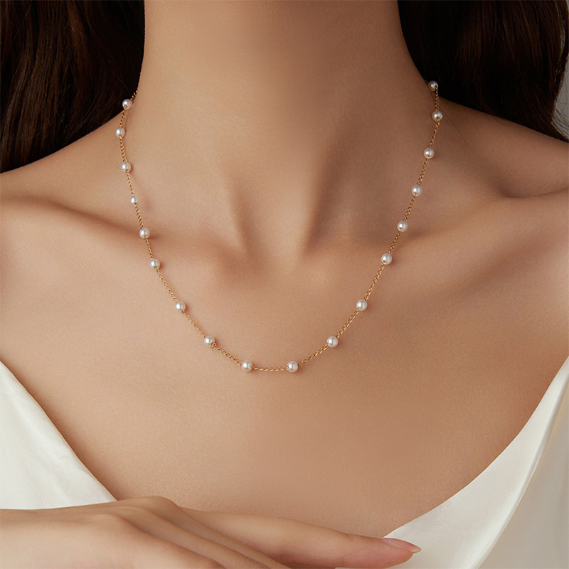 Factory wholesale stainless steel spaced pearl chain necklace